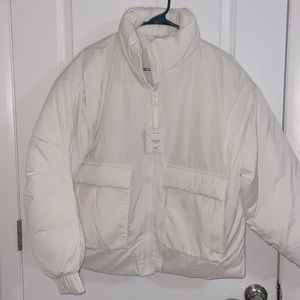 Fabletics All weather jacket. Color: Bone